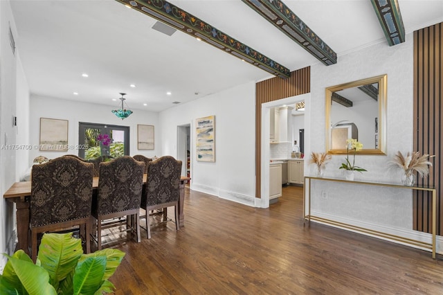 dining space with recessed lighting, baseboards, and wood finished floors