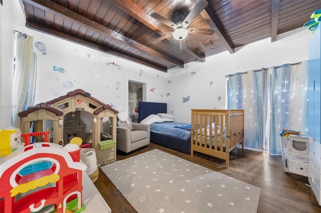 bedroom with wooden ceiling, visible vents, beamed ceiling, and wood finished floors