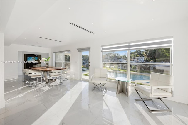 sunroom / solarium featuring visible vents