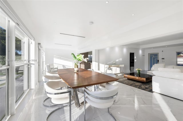 dining area with marble finish floor