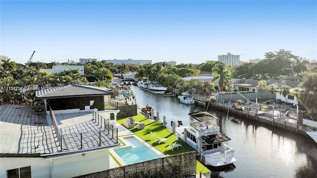 view of dock with a water view and an outdoor pool