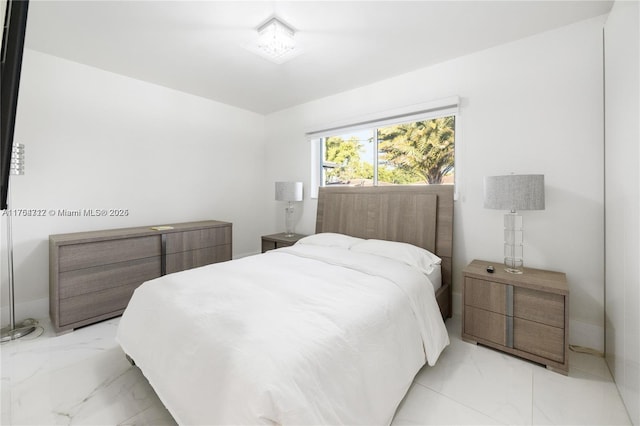 bedroom with marble finish floor