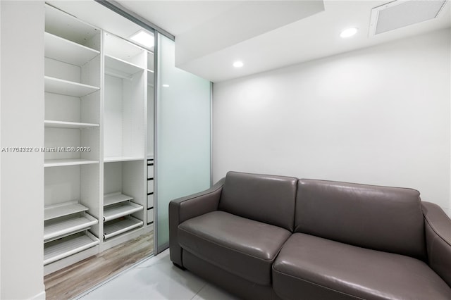 sitting room with visible vents and recessed lighting