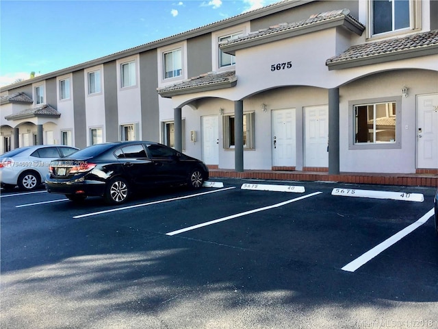 view of uncovered parking lot