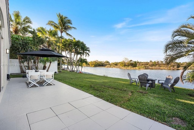 view of patio featuring a water view