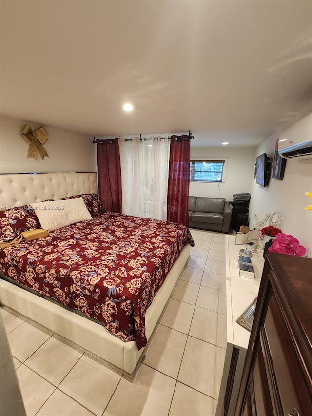 bedroom with recessed lighting, light tile patterned flooring, and a wall unit AC