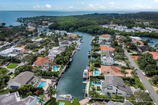 bird's eye view with a water view