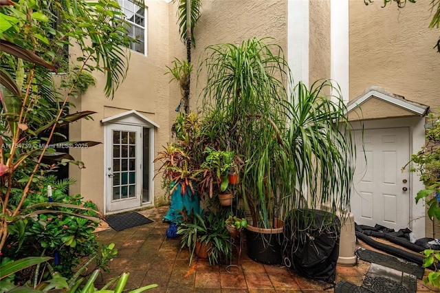 exterior space featuring stucco siding