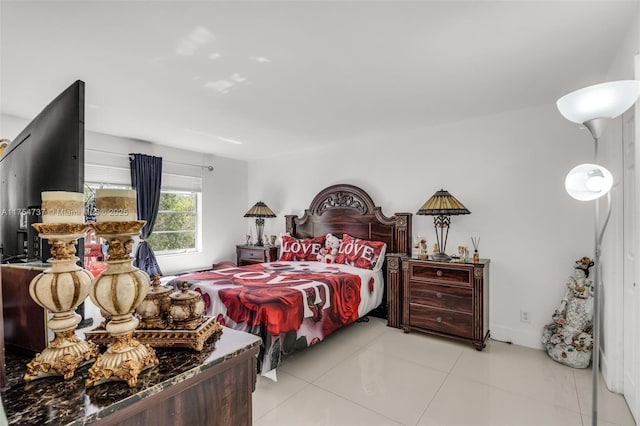 bedroom featuring tile patterned floors