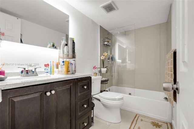 full bathroom with tile patterned flooring, toilet, bathing tub / shower combination, vanity, and visible vents