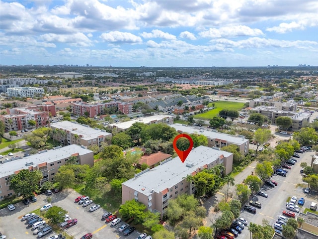 birds eye view of property with a city view