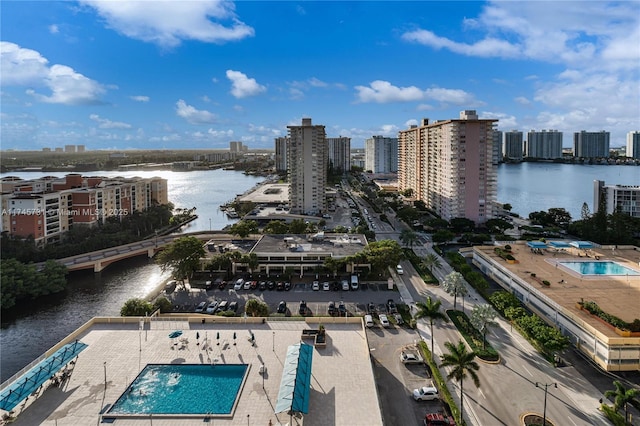 bird's eye view with a city view and a water view