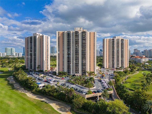 birds eye view of property featuring a city view