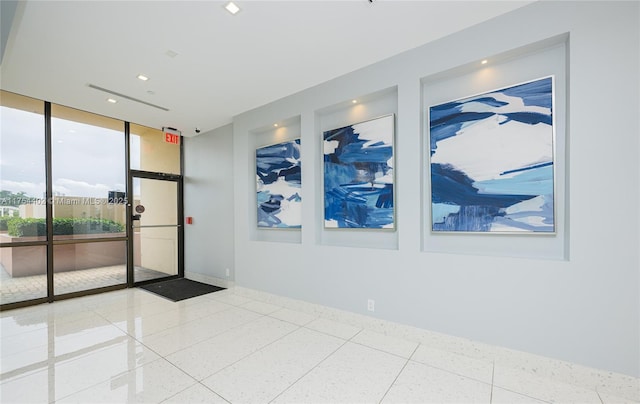 unfurnished room with baseboards, recessed lighting, tile patterned floors, and floor to ceiling windows