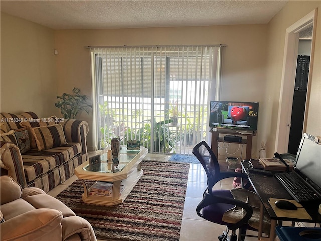 tiled living room with a textured ceiling