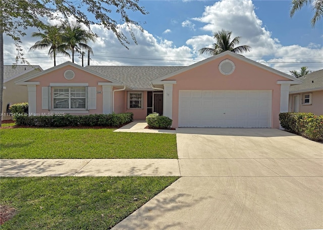 single story home with a garage, driveway, a front lawn, and stucco siding