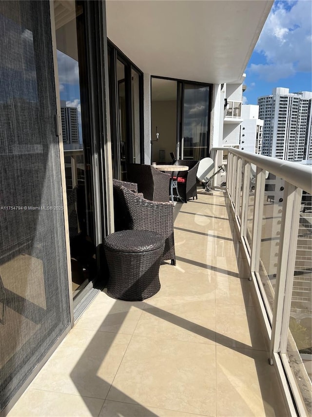 balcony featuring a view of city