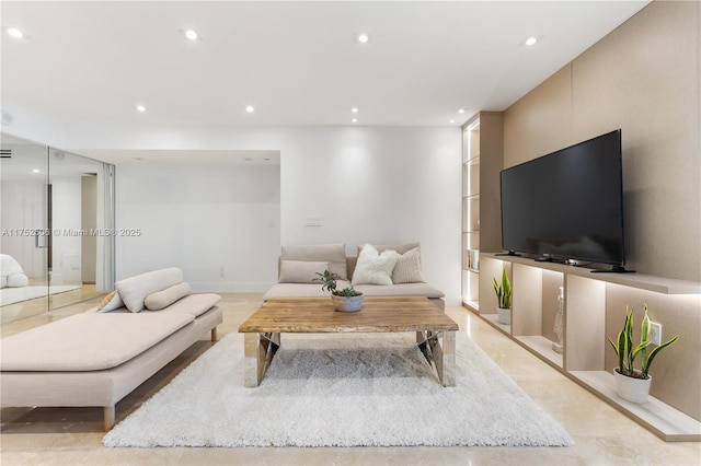 living area featuring recessed lighting