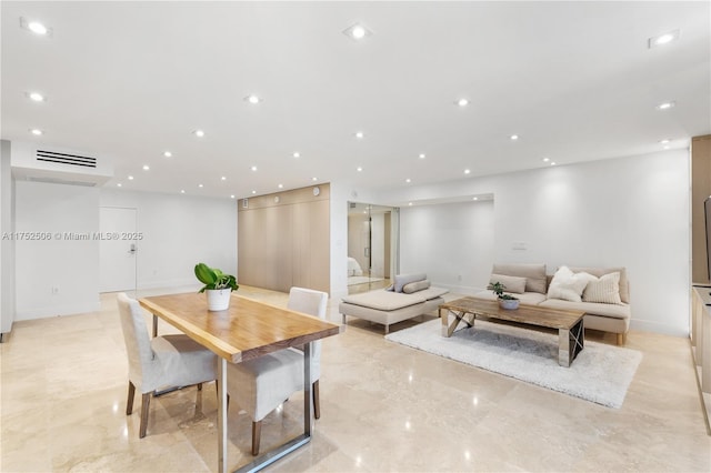 living room featuring baseboards, marble finish floor, visible vents, and recessed lighting