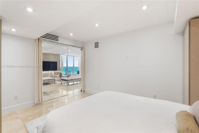 bedroom with baseboards, visible vents, and recessed lighting