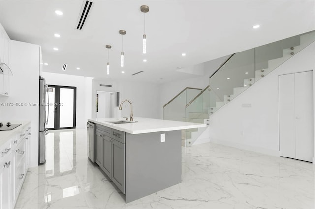 3430 SW 2nd St, Miami, FL 33135 - kitchen featuring marble finish floor, stainless steel appliances, recessed lighting, gray cabinets, and a sink