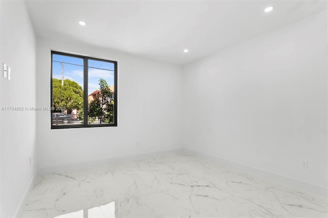 3430 SW 2nd St, Miami, FL 33135 - unfurnished room with marble finish floor, baseboards, and recessed lighting