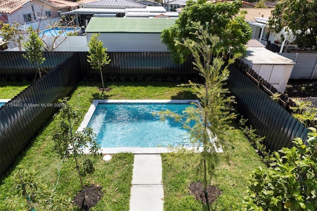 3430 SW 2nd St, Miami, FL 33135 - view of pool featuring a yard, a fenced backyard, and a fenced in pool