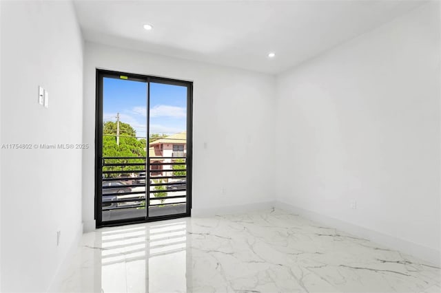 3430 SW 2nd St, Miami, FL 33135 - empty room with recessed lighting, marble finish floor, and baseboards