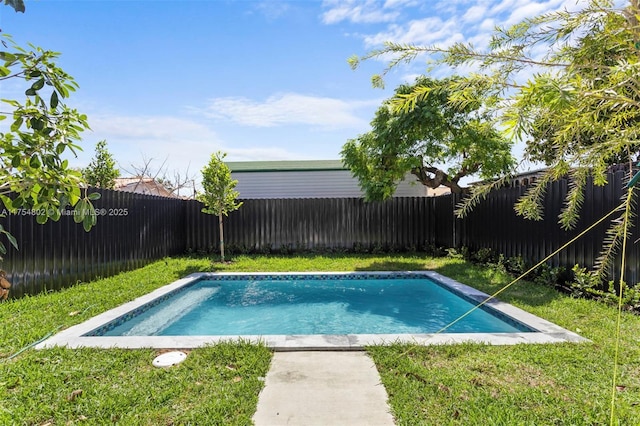 3430 SW 2nd St, Miami, FL 33135 - view of pool with a fenced in pool, a fenced backyard, and a lawn