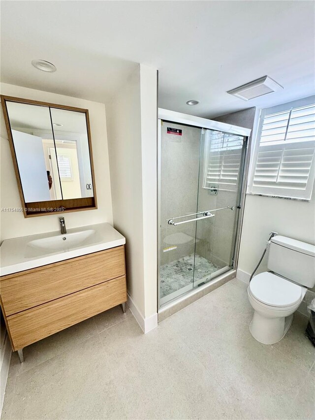 555 Crandon Blvd Unit 32, Key Biscayne, FL 33149 - full bath featuring baseboards, vanity, toilet, and a shower stall