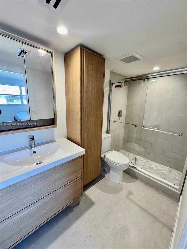 555 Crandon Blvd Unit 32, Key Biscayne, FL 33149 - bathroom with a shower stall, vanity, toilet, ensuite bath, and recessed lighting