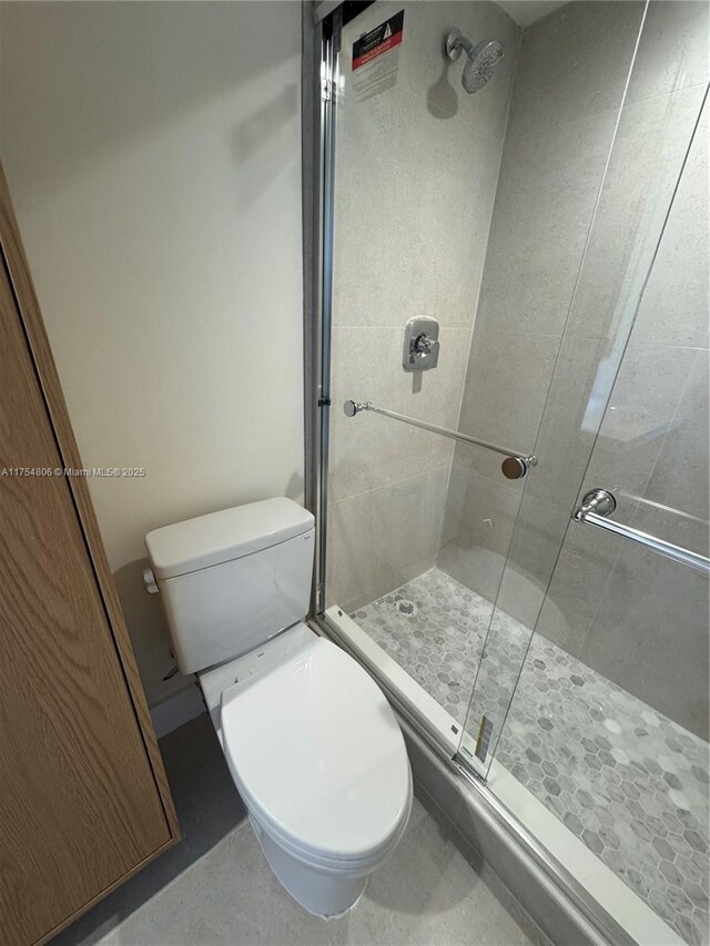555 Crandon Blvd Unit 32, Key Biscayne, FL 33149 - bathroom with toilet and a stall shower