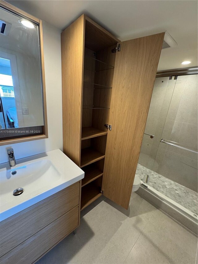 555 Crandon Blvd Unit 32, Key Biscayne, FL 33149 - full bath featuring vanity, a stall shower, and toilet