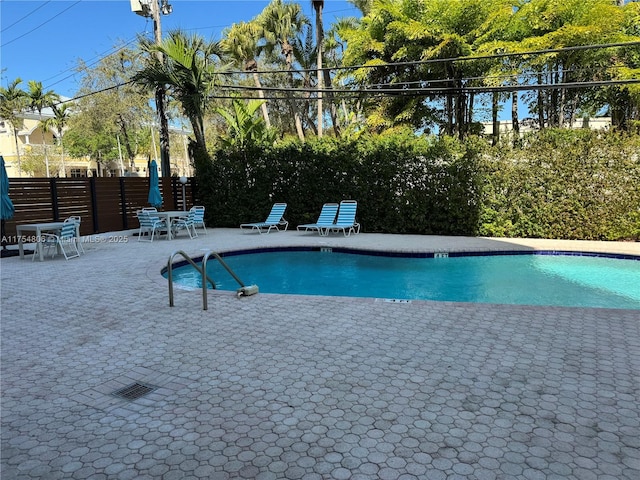 555 Crandon Blvd Unit 32, Key Biscayne, FL 33149 - community pool featuring a patio area
