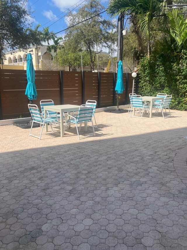 555 Crandon Blvd Unit 32, Key Biscayne, FL 33149 - view of patio / terrace featuring outdoor dining space