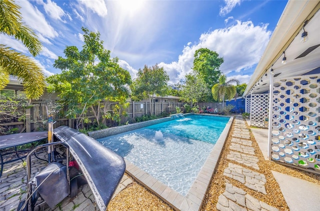 2217 NE 14th Ave, Wilton Manors, FL 33305 - view of pool featuring a fenced in pool, a fenced backyard, and a patio