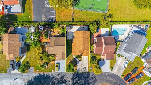 birds eye view of property with a residential view