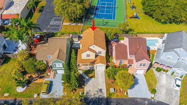 birds eye view of property with a residential view