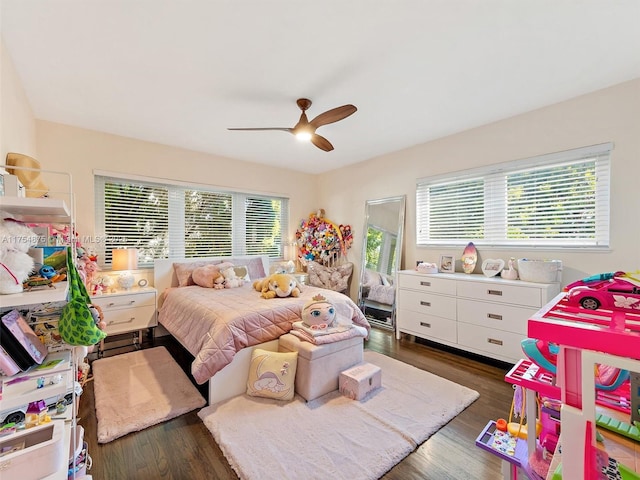 bedroom featuring dark wood-style flooring and a ceiling fan