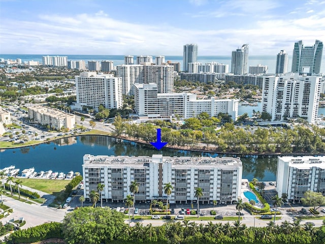 aerial view with a water view and a city view