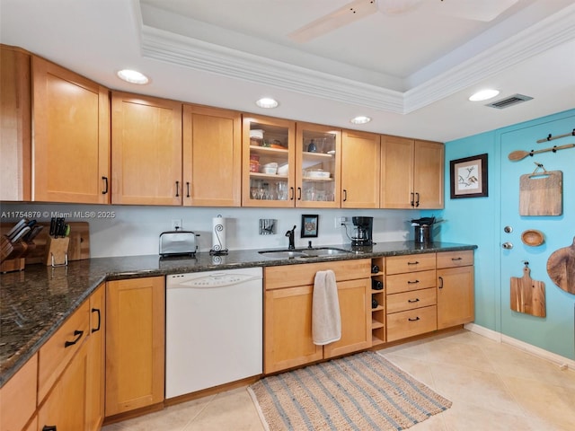 kitchen featuring a sink, white dishwasher, a raised ceiling, and recessed lighting