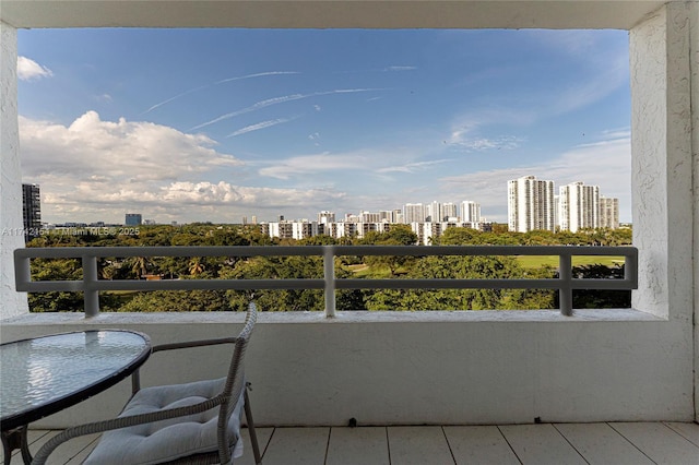 balcony featuring a city view