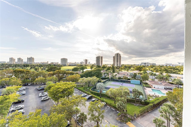 birds eye view of property with a city view