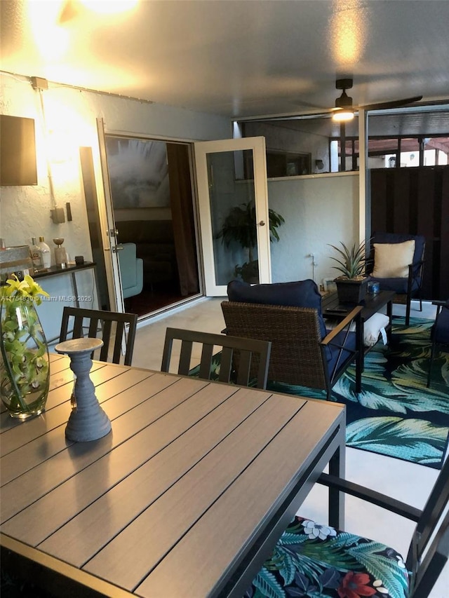 dining area featuring a ceiling fan