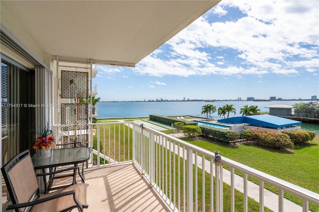 balcony featuring a water view