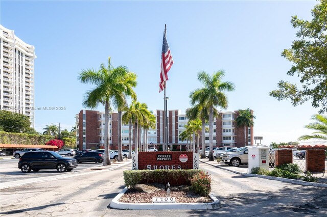 1700 NE 105th St Unit 216, Miami Shores, FL 33138 - view of property featuring uncovered parking