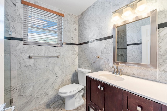 bathroom featuring tile walls, vanity, and toilet