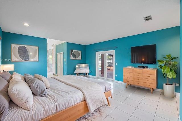 bedroom featuring access to outside, visible vents, baseboards, and light tile patterned flooring