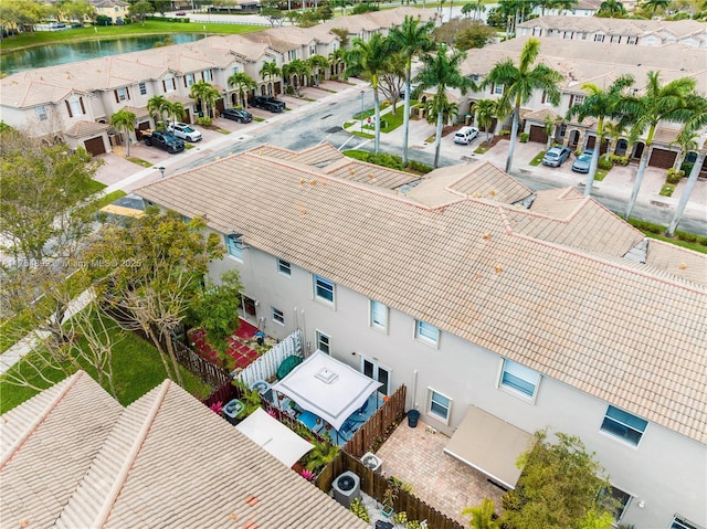 aerial view featuring a water view and a residential view