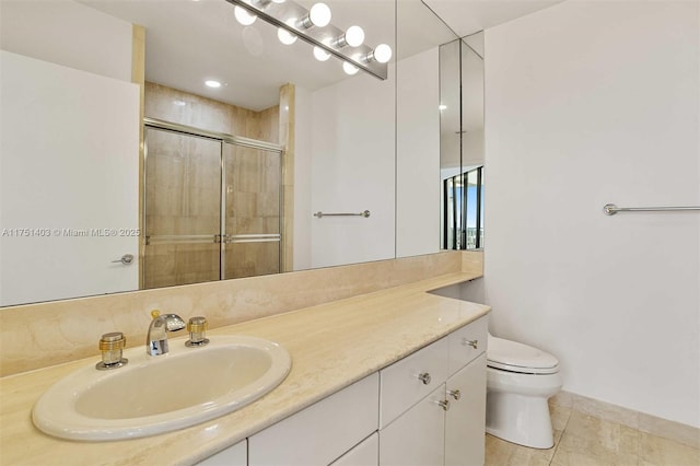 full bathroom featuring a stall shower, tile patterned flooring, vanity, and toilet